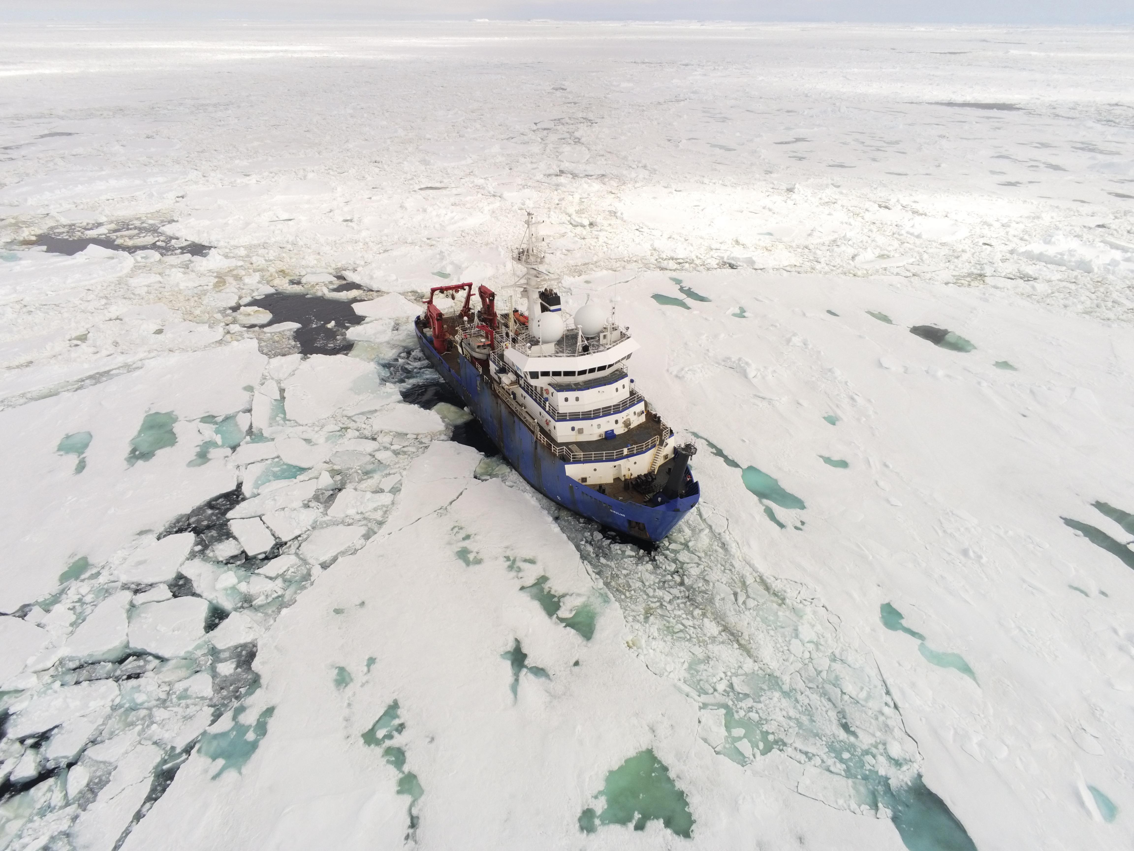 A research ship in a sea of ice.