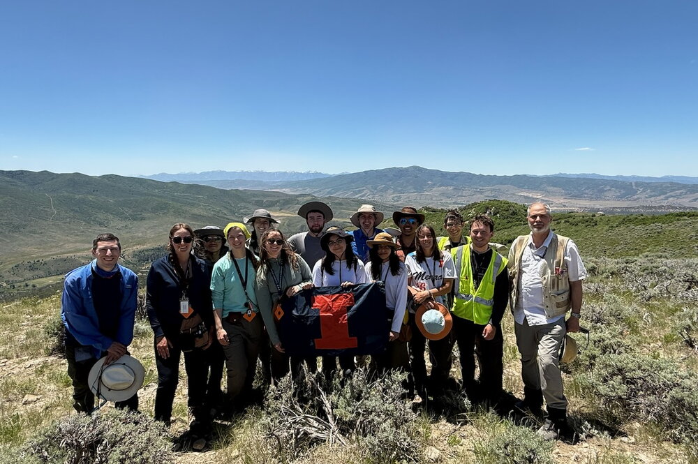 Illinois students on top of a mountain in Utah