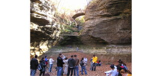 Students at the waterfall at Matthiessen State Park