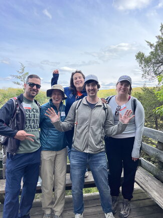 A group of people pose for a picture